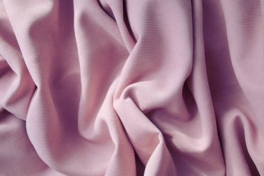 Folds of pink fabric, abstract background