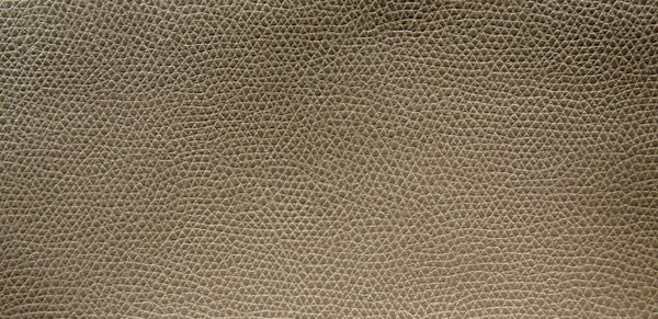 Pattern on brown leather surface