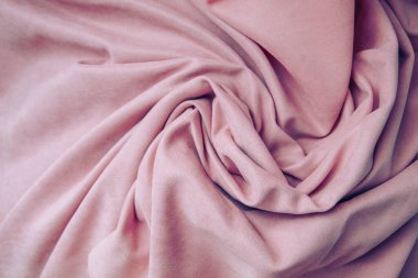 Folds of pink fabric, abstract background