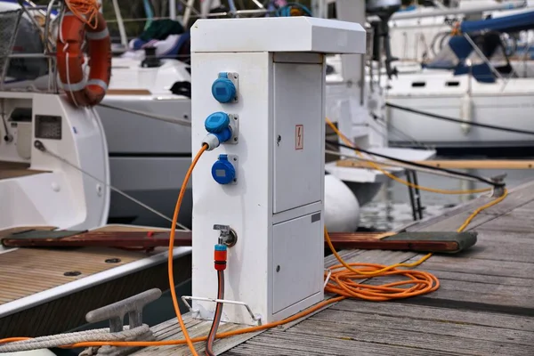 Electrical power box pedestal in Pakleni Islands harbor,  Croatia.