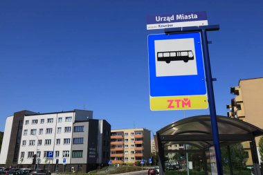 KNUROW, POLAND - MAY 11, 2021: Bus stop in front of Town Hall (Polish: Urzad Miasta) of Knurow, Poland. ZTM is the public transport organization in Upper Silesia region of Poland.