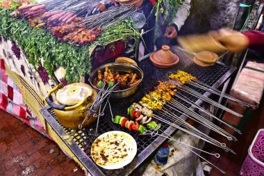 Barbecued Moroccan style meat at Jemaa el-Fnaa square market of Marrakech. clipart