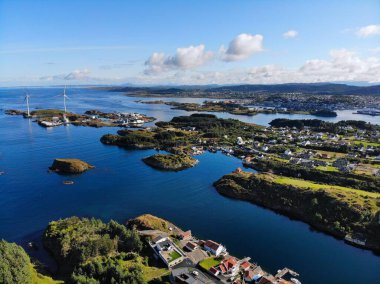 Norway islands drone view. Rogaland county island landscape with near Haugesund. Wind turbines. clipart