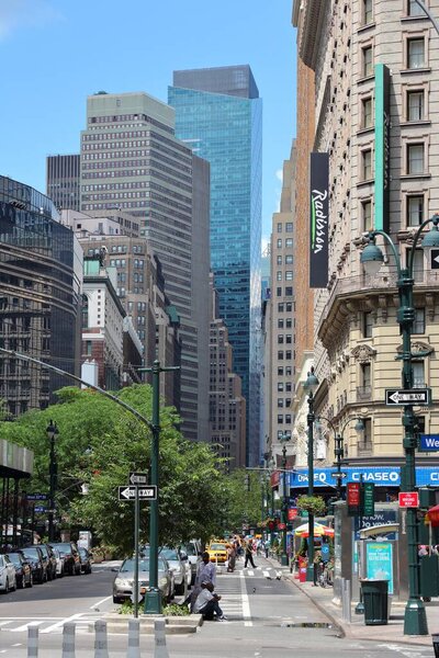NEW YORK, USA - JULY 4, 2013: People walk in Koreatown in New York. Circa 19 million people live in New York City metropolitan area.