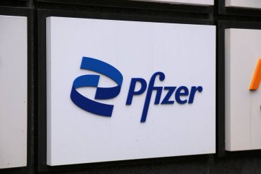 SEOUL, SOUTH KOREA - APRIL 6, 2023: Pfizer company office in Seoul. Pfizer is an American biotechnological and pharmaceutical company. clipart