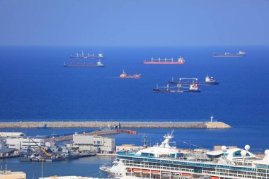 HAIFA, ISRAEL - OCTOBER 31, 2022: Ships waiting for entry to Port of Haifa, a major seaport in Israel. One of 3 major ports in Israel.