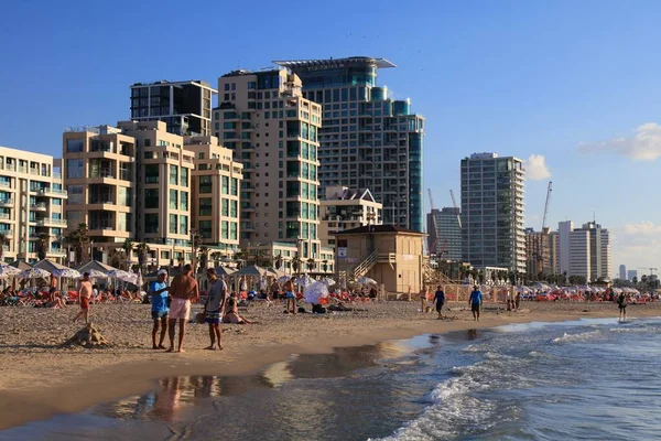 TEL AVIV, ISRAEL - NOVEMBER 2, 2022: People visit Allenby Beach (also known as Jerusalem Beach) in Tel Aviv, Israel. Tel Aviv is the economic and technological center of Israel.