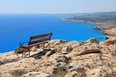 Beautiful Cyprus. Bench with a view of Mediterranean Sea landscape at Cape Greco in Cyprus.