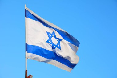 Flag of Israel in the wind. Israeli national colors.