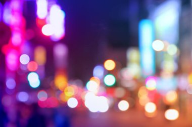 Gece büyük şehir ışıkları - Tayvan 'ın Taichung şehrinin odağından çıkarıldı. Bulanık neonlar.