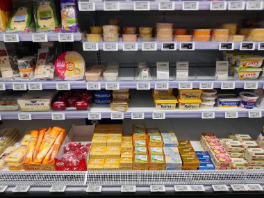 INNSBRUCK, AUSTRIA - AUGUST 10, 2022: Prices of butter in dairy section in a generic supermarket in Austria.