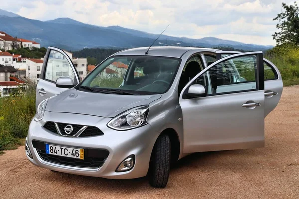 COIMBRA, PORTUGAL - 26 Mayıs 2018: Nissan Micra kompakt hatchback car in Portugal. Portekiz 'de 5.1 milyondan fazla motorlu araç kayıtlı..