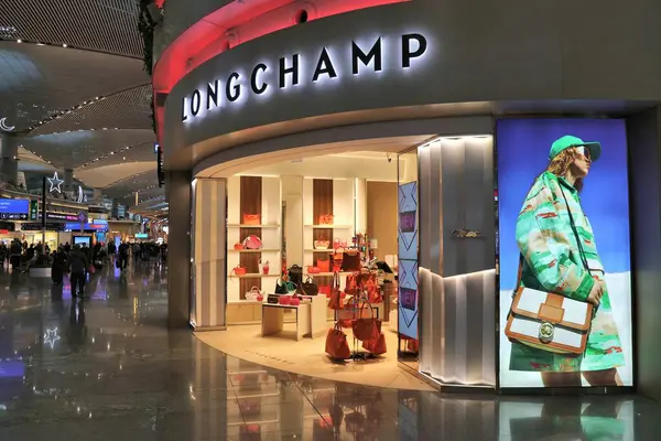 stock image ISTANBUL, TURKEY - APRIL 11, 2023: Longchamp luxurry handbag brand duty free shop at Istanbul Airport, one of busiest airports in the world.