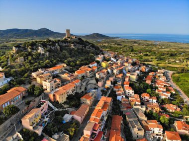 Posada town skyline in Sardinia, Italy. Posada in Province of Nuoro. clipart