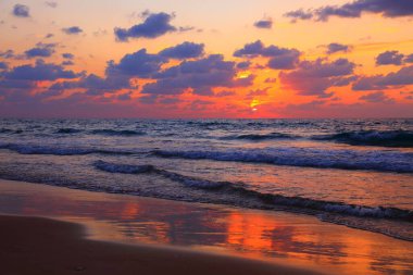 Sunset on Dado Beach in Haifa. Sandy beach in Haifa, Israel. clipart