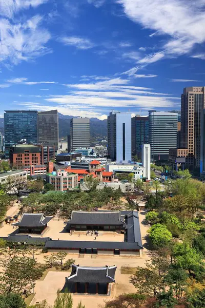 stock image Seoul city view in South Korea. City skyline of Jeongdong district (Jeong-dong), with Deoksugung Royal Palace.