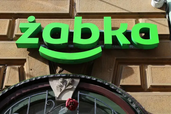 stock image CIESZYN, POLAND - MAY 30, 2024: Zabka convenience store in the old town of Cieszyn, Poland. Zabka is one of largest franchising businesses in Poland.