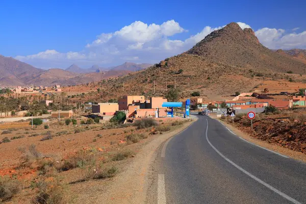 stock image Anti-Atlas mountain road landscape with small town near Tighmi, Morocco. Tiznit Province.