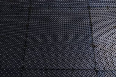 Elmas kaplama fabrika katı. Metal yüzey zemin - paslanmaz çelik zemin. Gece Koyu Metal Fotoğraf.