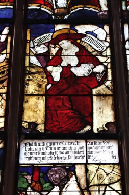 NUREMBERG, GERMANY - MAY 8, 2018: Stained glass depicting Saint Jerome in St. Lorenz Kirche (Saint Lawrence Church) in Nuremberg. clipart