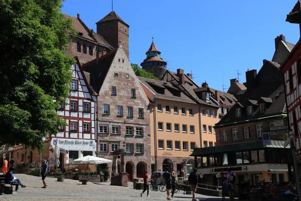 stock image NUREMBERG, GERMANY - MAY 8, 2018: People visit the Old Town in Nuremberg, Germany. Nuremberg is located in Middle Franconia region.