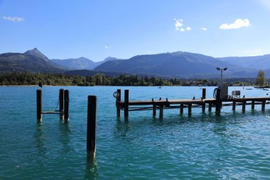 Wolfgangsee mountain lake pier in Austrian Alps. Austria landscape in Salzkammergut region. clipart