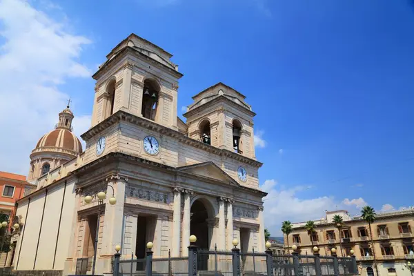 stock image Main square of Giarre town, Metropolitan City of Catania in Sicily, Italy. Cathedral of St. Isidore at Piazza del Duomo.