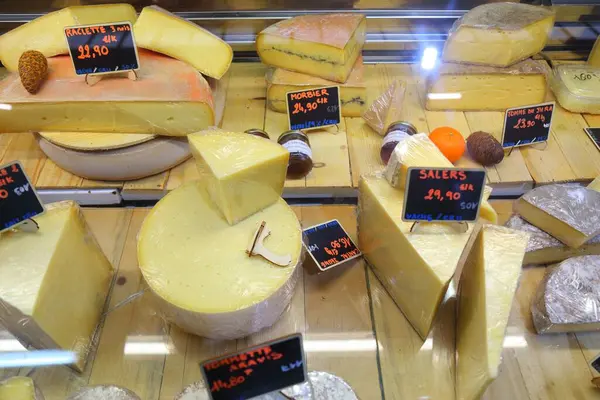 stock image BEZIERS, FRANCE - OCTOBER 3, 2021: Cheese store at the market hall (Les Halles) in Beziers, France. Beziers is a subprefecture town of the Herault department in Occitanie region.