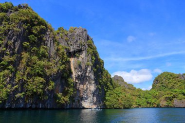 Philippines Palawan island nature. Karst rock cliffs landscape - Palawan island hopping tour in Philippines. clipart