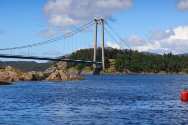 Stord Bridge (Stordabrua) in Norway. Large suspension bridge, part of Triangle Link (Trekantsambandet) connecting the islands of Bomlo and Stord with Norwegian mainland. clipart