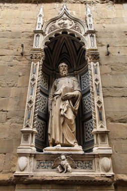 Saint statue of Orsanmichele church facade in Florence, Italy. Saint Mark the Evangelist Renaissance sculpture by Donatello. clipart