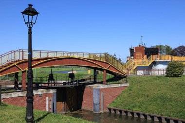 Kedzierzyn-Kozle, city in Poland. Water step on river Odra, and historic Kozle Lock (Polish: Sluza Kozle) on the waterway. clipart