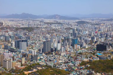 SEOUL, Güney Kore - 8 Nisan 2023 Güney Kore 'deki Seul şehir manzarası. Jung, Dongdaemun ve Jongno şehirleri Ssangnim-dong, Changsin-dong ve Chungmuro mahalleleriyle çevrili..