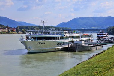 WACHAU, AUSTRIA - JULY 31, 2022: Danube river cruise ship stops in Melk in Wachau region of Austria.