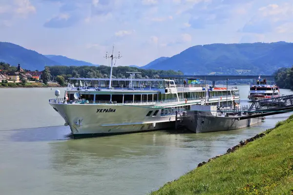 WACHAU, AUSTRIA - JULY 31, 2022: Danube river cruise ship stops in Melk in Wachau region of Austria.