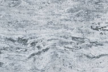 Gerçek taş zemin. Seramik fayanslarda veya dijital arkaplan olarak kullanmak için gri travertin doğal taş dokusu arkaplanı.