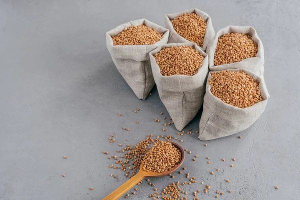 Organic Farming Concept Five Small Sacks Buckwheat Useful Properties Can — Stock Photo, Image