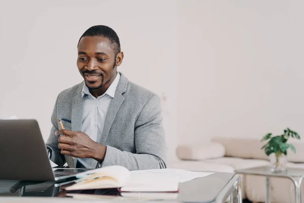 Smiling African American Man Working Laptop Online Office Desk Black — Zdjęcie stockowe
