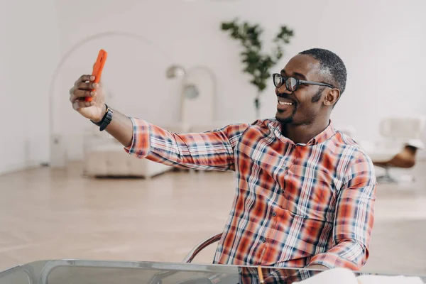 Happy Afro Man Has Video Call Phone Talks Friend Businessman — Zdjęcie stockowe
