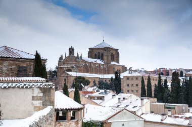 Salamanca, Spain - 10 January 2021: New Cathedral of Salamanca covered with snow clipart