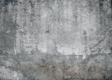 Çatlaklı sert beton duvarın soyut grunge dokusu.