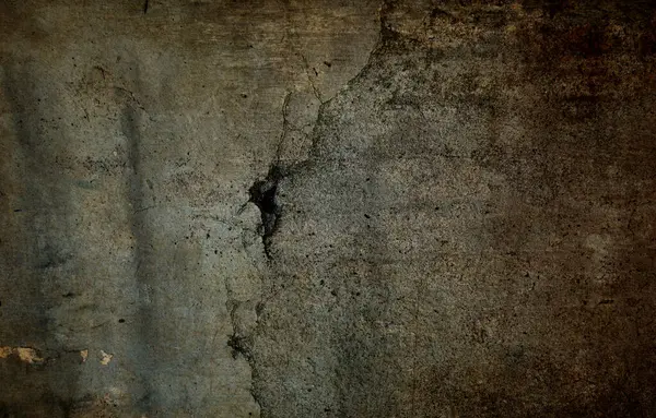 Hasarlı soyut çatlamış beton arka plan.