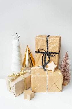 Christmas, gifts, Christmas tree, decorations. The concept of preparing for the holiday, buying and wrapping gifts