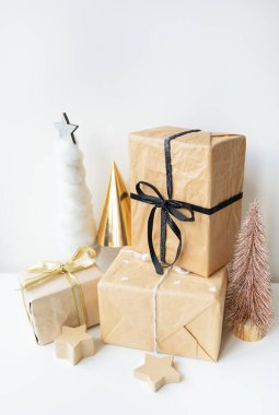 Christmas, gifts, Christmas tree, decorations. The concept of preparing for the holiday, buying and wrapping gifts.