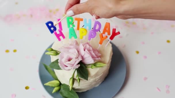 Woman Lighting Candle White Chocolate Cake Girl Hand Holds Match — Stock Video