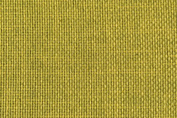 A green woven fabric texture. The image is a full frame of the fabric with a slight variation in the color and texture
