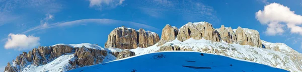Beautiful winter mountain view  from Pordoi Pass with snow screen (pass in the Dolomites in the Alps)