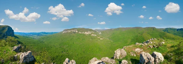 Spring Crimea Mountain country panorama with valley and Sokolyne Village (Ukraine). Great Crimean Canyon environs.