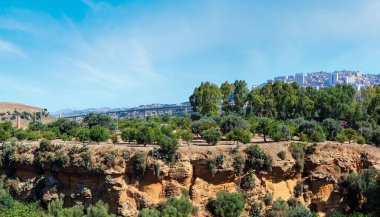 View to highway from famous ancient ruins in Valley of Temples, Agrigento, Sicily, Italy. UNESCO World Heritage Site.