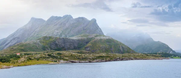 stock image Ranfjorden Fjord summer cloudy view from ferry (Norway). Panorama.